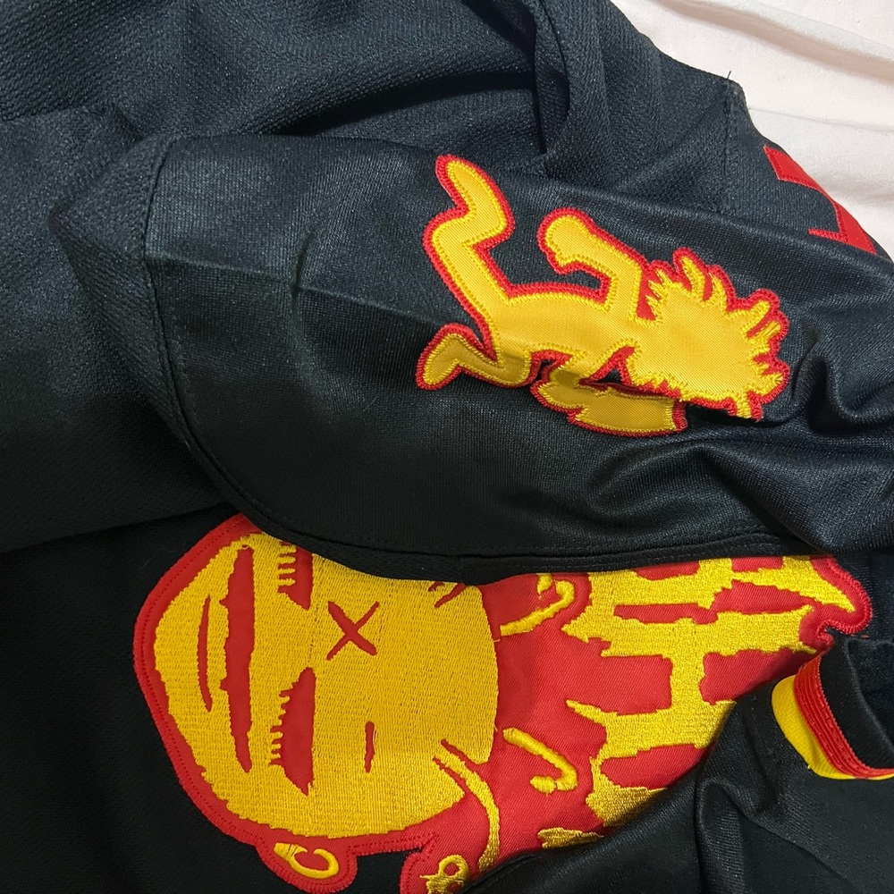 CCM Black Jersey with Red and Yellow Graphic - Picture 5 of 6